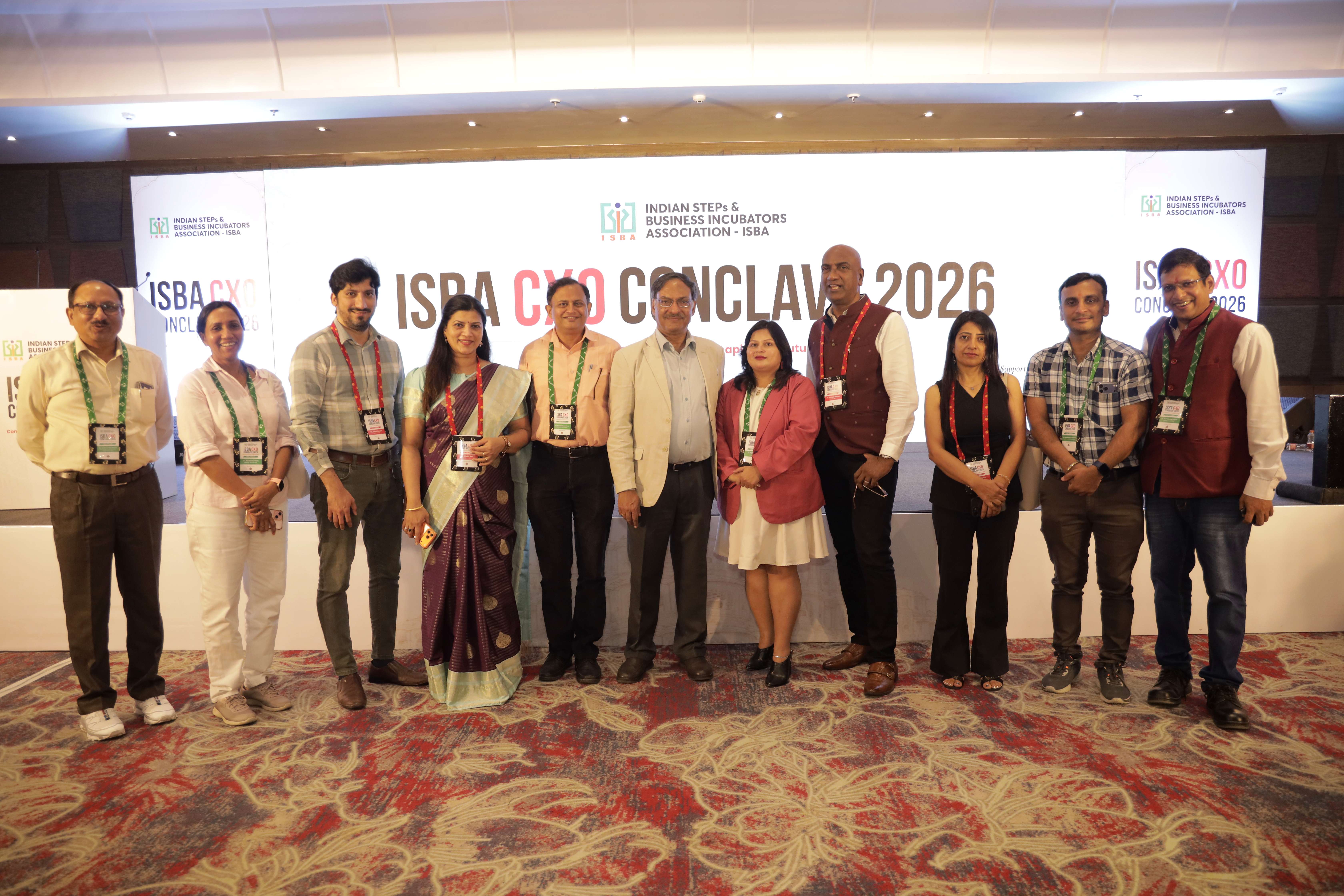 Delegate group at the conclave backdrop
